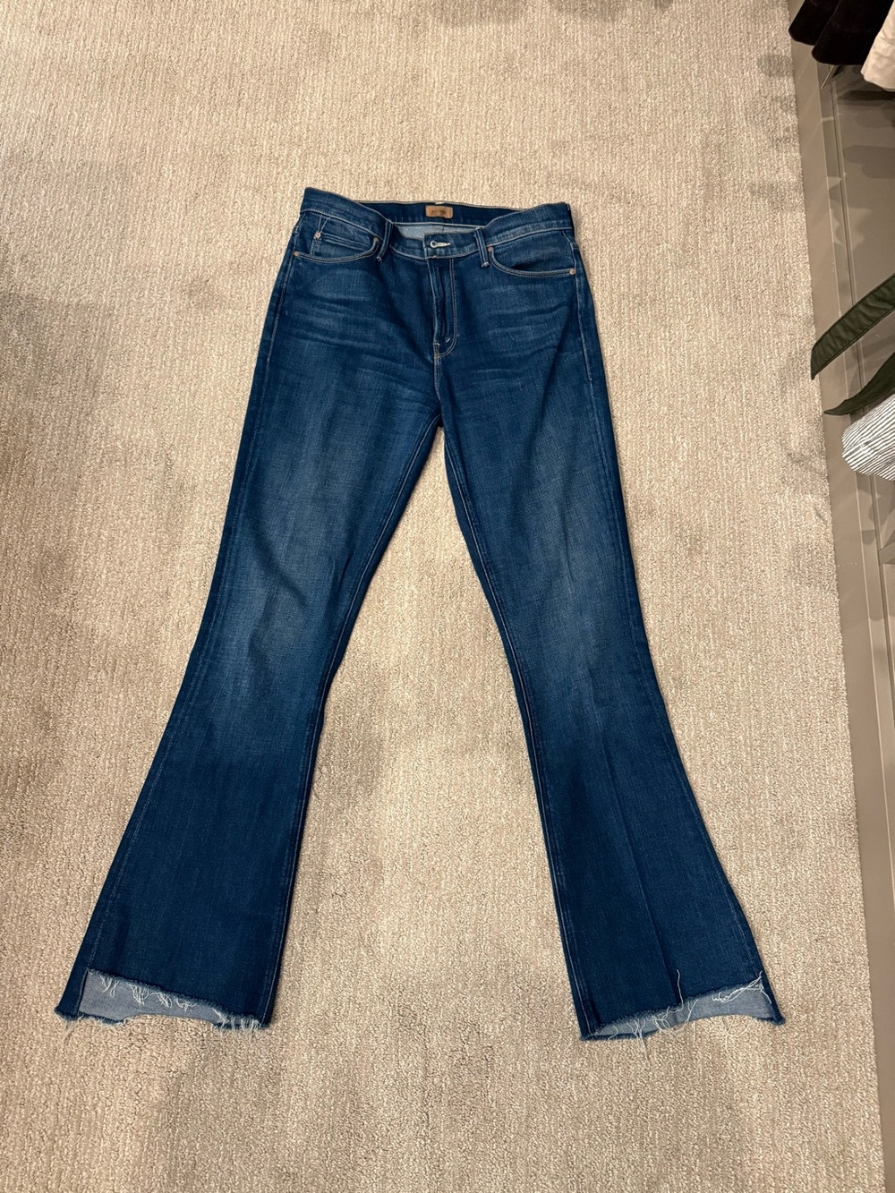 MOTHER Dark Blue Flare Jeans with Raw Hem. The Runaway Fray Style
